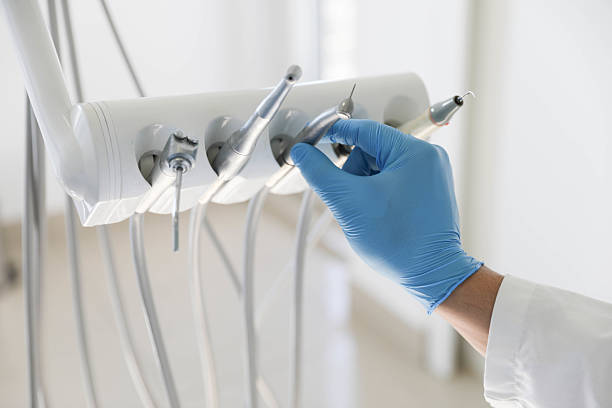 Professional Tooth Extraction technician working in Pimmit Hills, VA